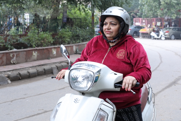 Woman on a scooter